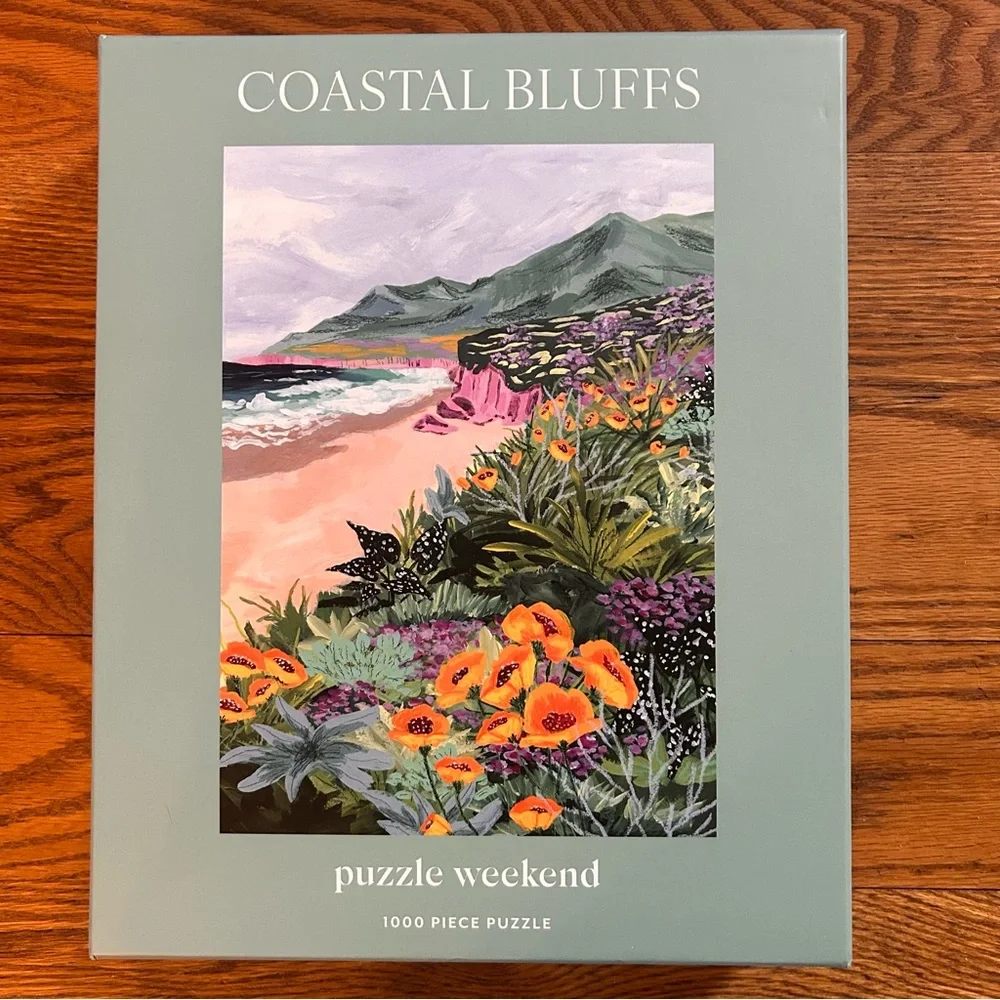 Coastal Bluffs Puzzle Weekend 1000-Piece Jigsaw Puzzle - Green Box - Picture 1 of 7